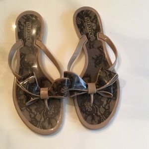 Valentino lace bow flip flops